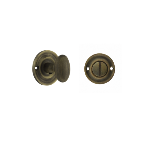 Bathroom turn & release in Antique Brass